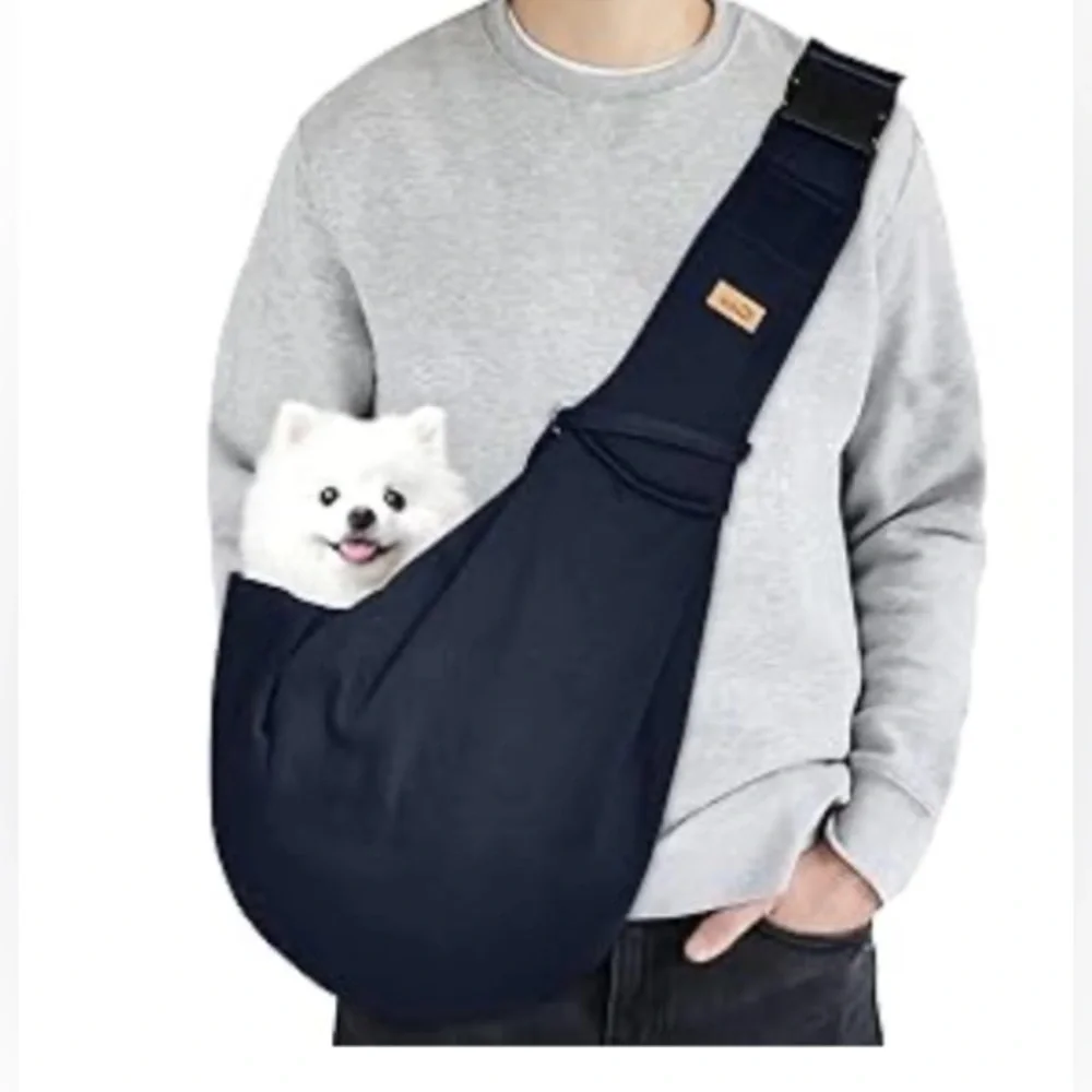 Dog and Cat Sling Carrier. Hands Free and  Reversible for medium pets.